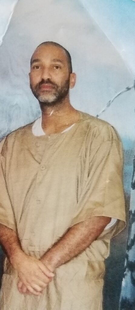 Photo of man in prison clothes